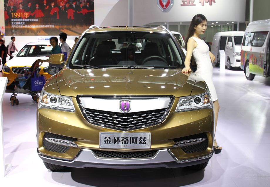 �ٰ������ɽ𱭴��������SUV,ǰ���ο����ձ�Ʒ��ک������Ԫ�ء�