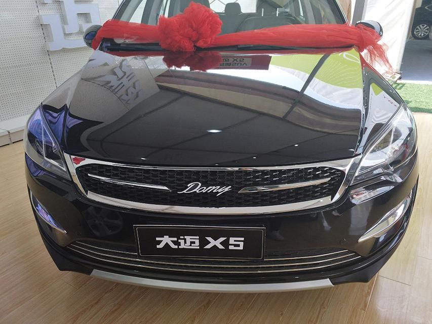 X5ǰͲû̫ɷ֣κɫΧ׺һȦƸդмλZotyeӢLOGO