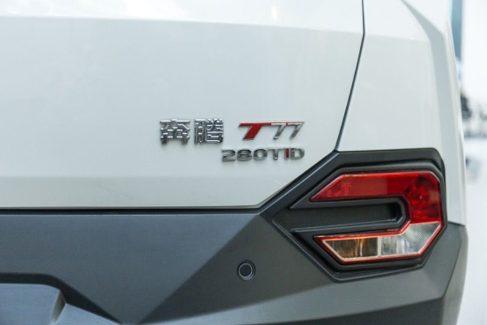 ⣬T77