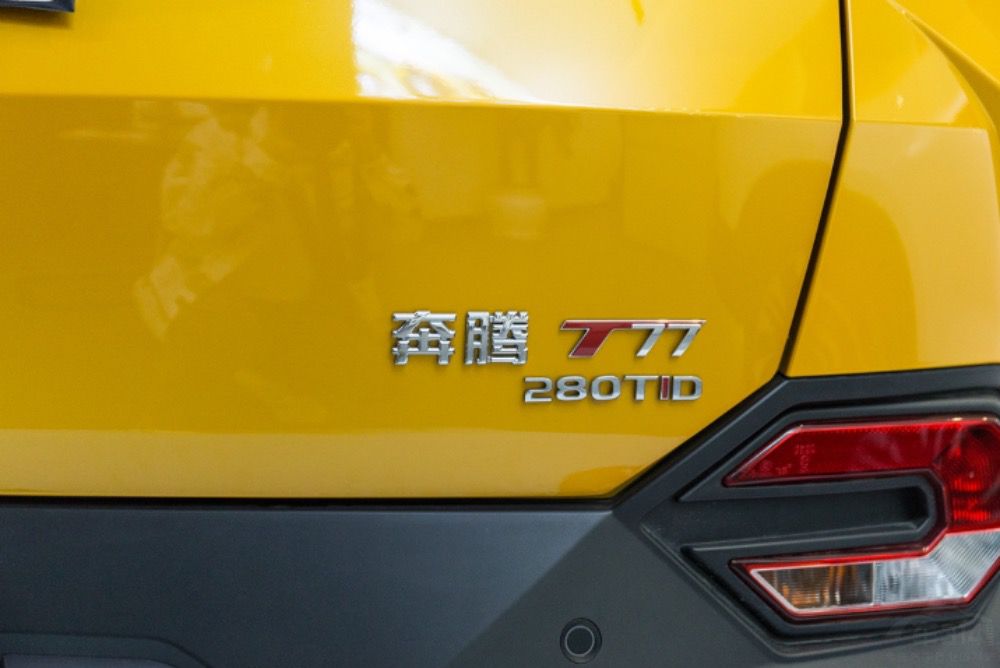 T77