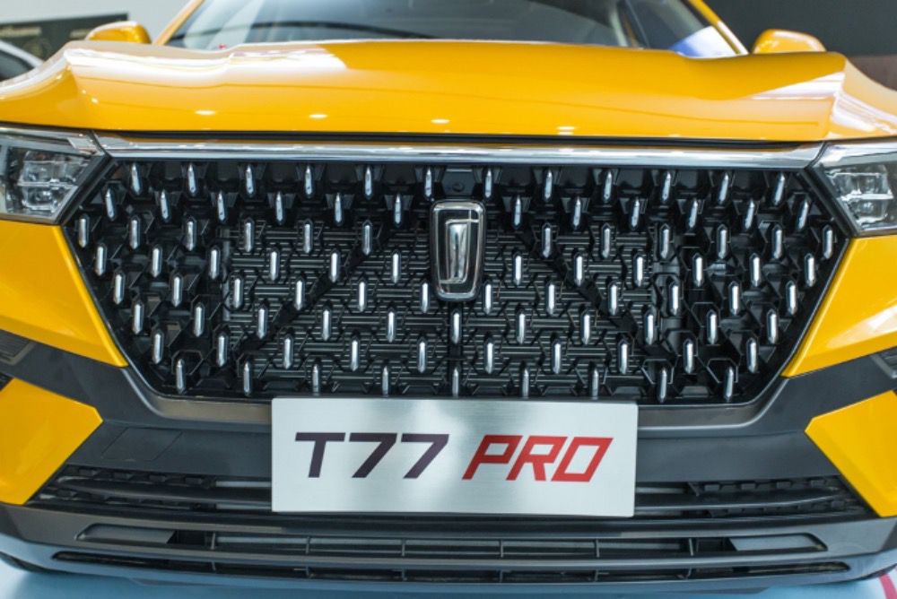 ΪαT77